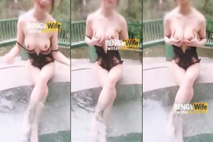 穿泳装好热，正妹泳池边露奶透气
